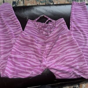 Bombshell Zebra print Leggings. Size small. Great condition